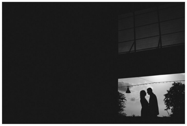 A joyful couple shares candid, romantic moments during their engagement session at The Pearl in San Antonio, Texas