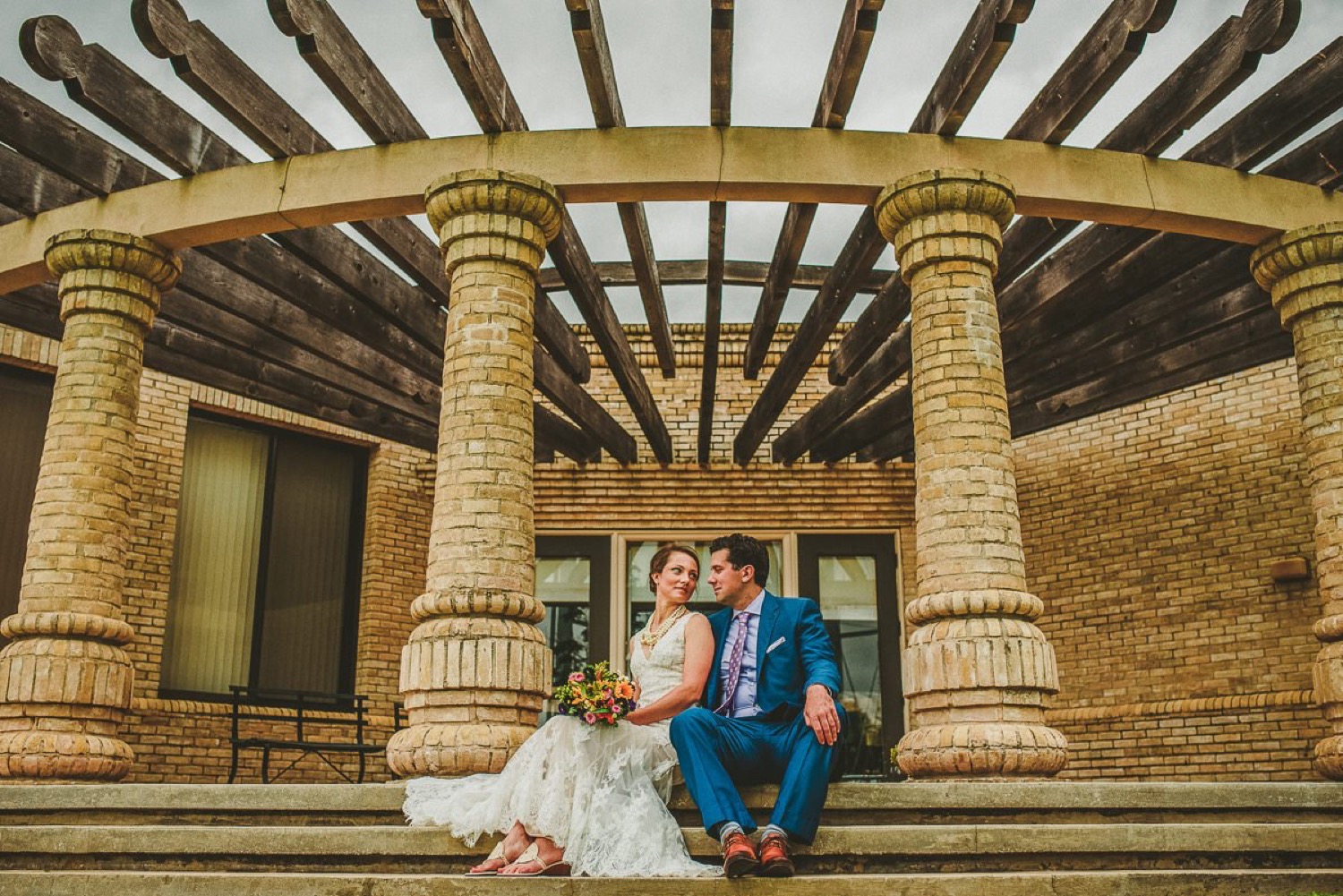 Laura and John during their intimate wedding at the Spanish Governor’s Palace with portraits at the McNay Art Museum, captured by San Antonio wedding photographer Christian Margain