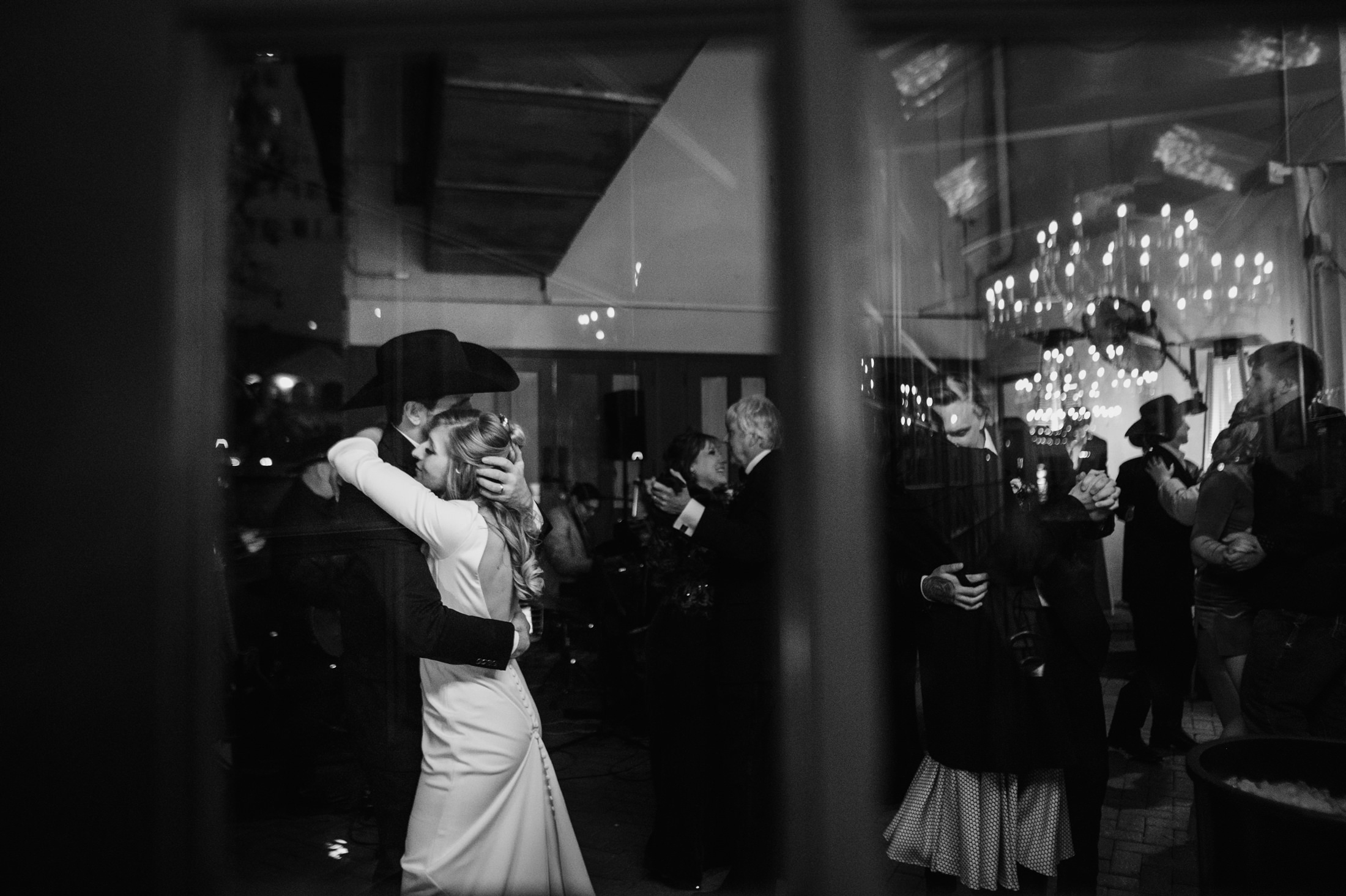 Couple's first dance at their San Antonio wedding, documentary moment captured by wedding photographer Christian Margain