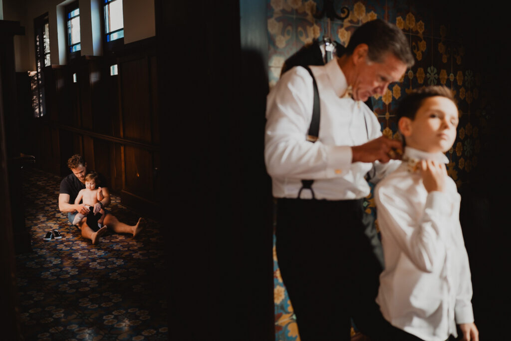 Family getting ready before a San Antonio wedding, candid documentary moment by photographer Christian Margain